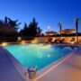 Outdoor pool at a private apartment at dusk