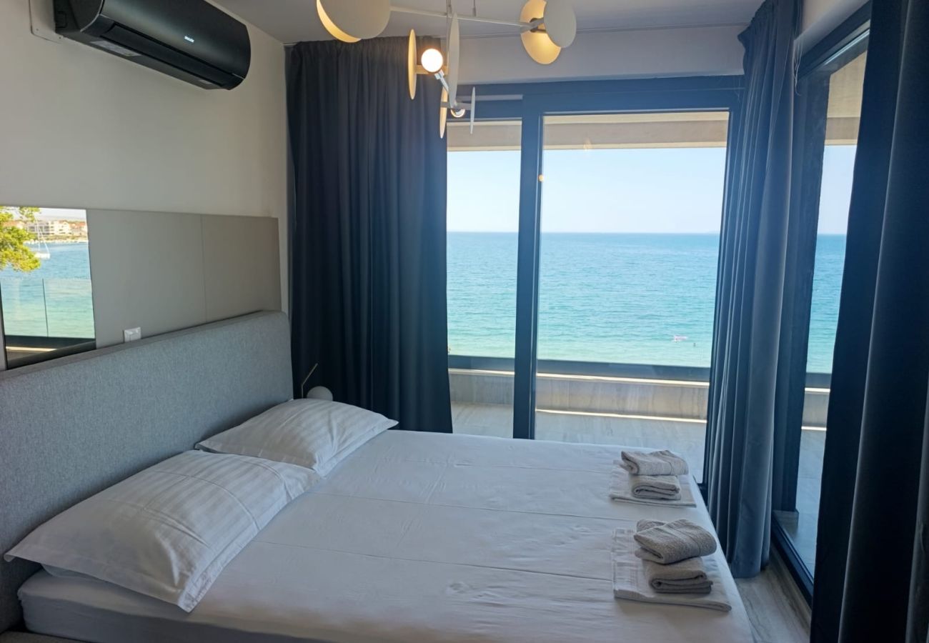 Apartment in Povljana - Beachfront penthouse Pearl