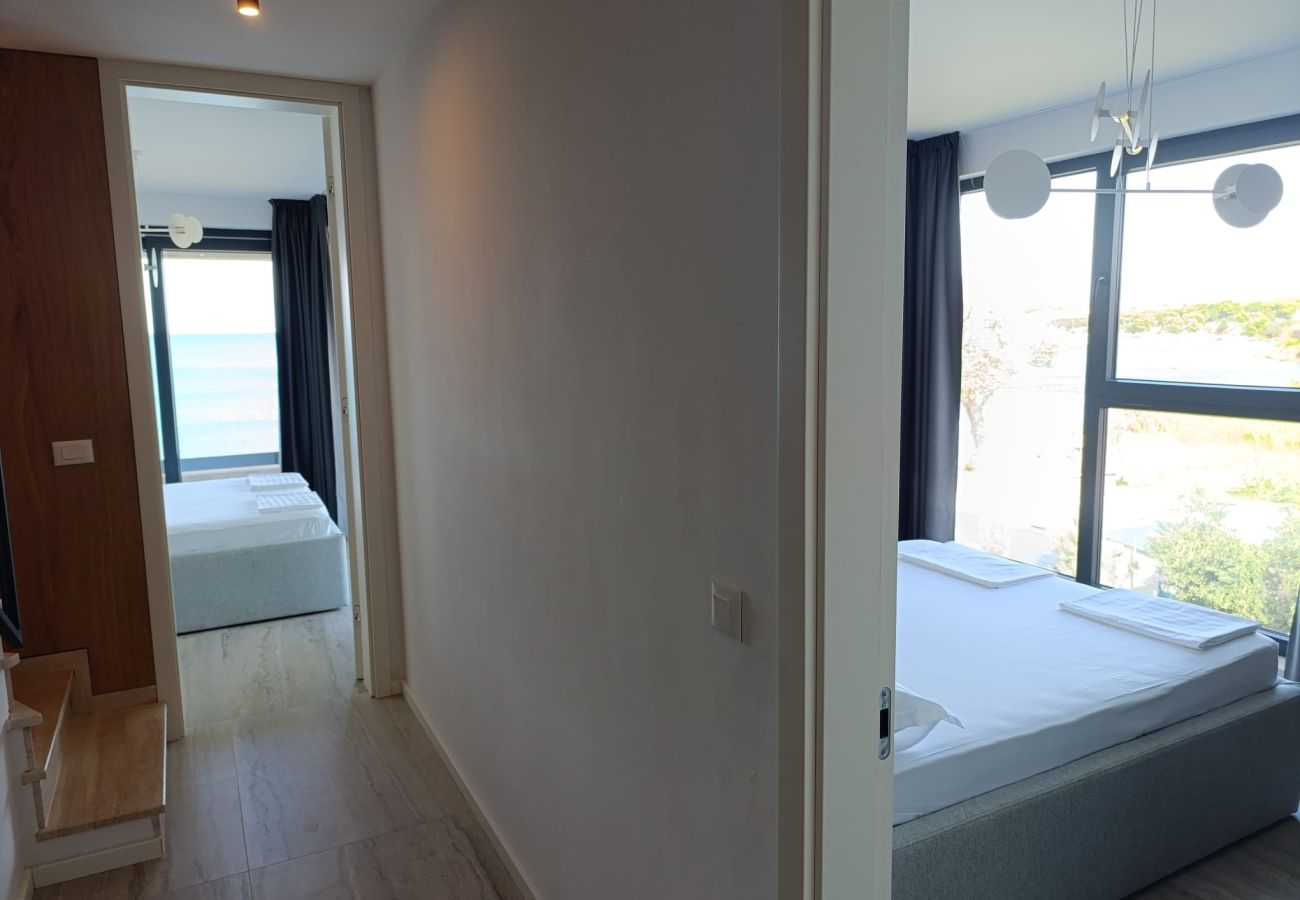 Apartment in Povljana - Beachfront penthouse Pearl