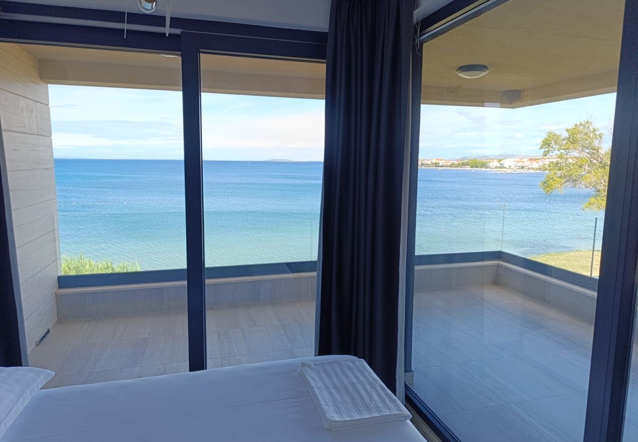 Apartment in Povljana - Beachfront penthouse Pearl